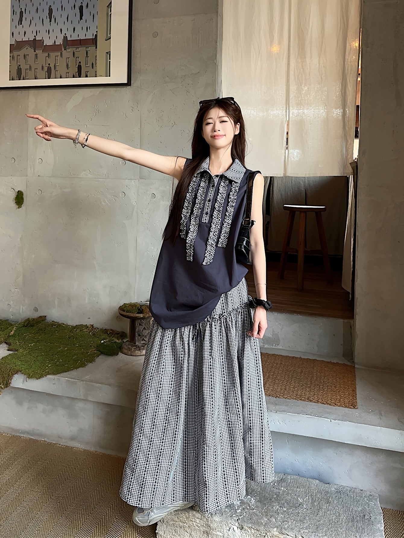 New Summer Loose Sleeveless Top with Retro Plaid Color-Blocking And Ruffled Collar, Paired with a Plaid Skirt for a Casual Two-Piece Set.