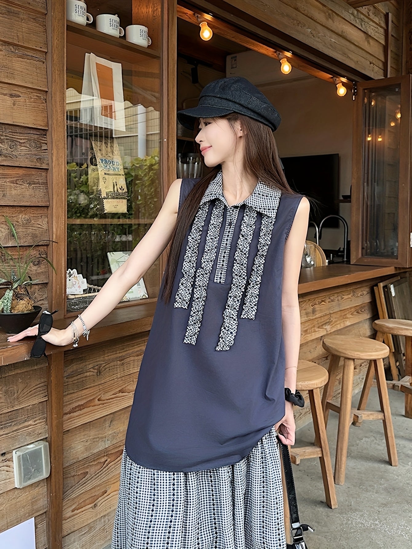 New Summer Loose Sleeveless Top with Retro Plaid Color-Blocking And Ruffled Collar, Paired with a Plaid Skirt for a Casual Two-Piece Set.
