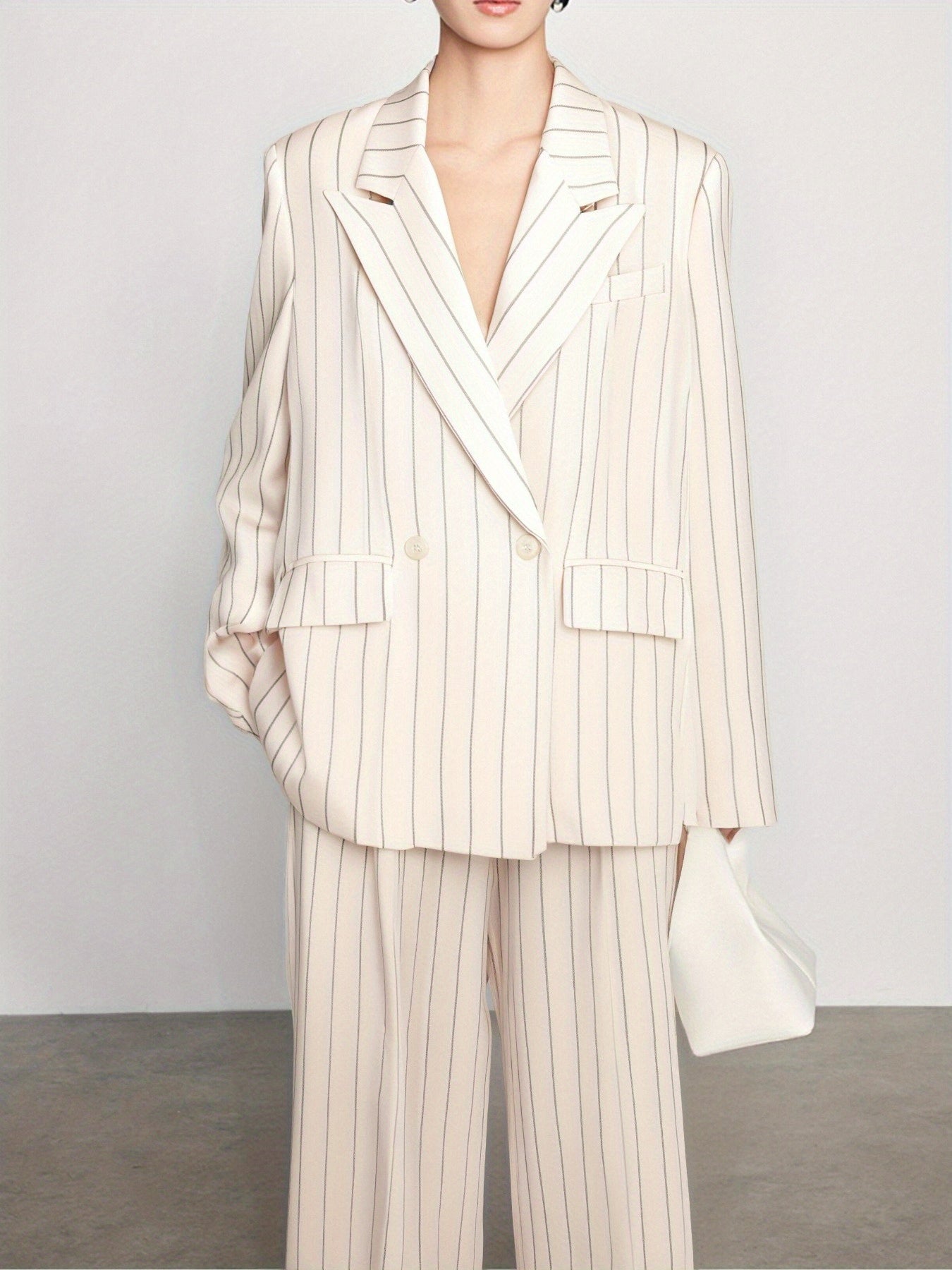 Spring-Summer New Women'S Suit Set with a Turned- Collar And Thin Stripes, Featuring a Double-Breasted Design for The Blazer And Wide-Leg Pants. It exudes a Professional And Elegant Look, Perfect for Office Commute, Business Events, And Formal Gatherings.