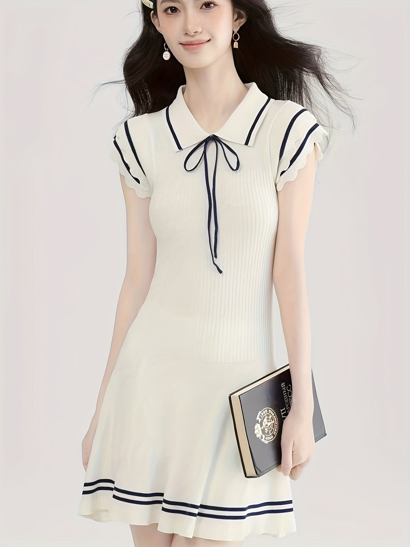 New summer style Women's dress in a pure, soft and preppy style. It has a sweet cinched waist, is versatile, exudes an elegant and slender look with a high - end feel, a short skirt.